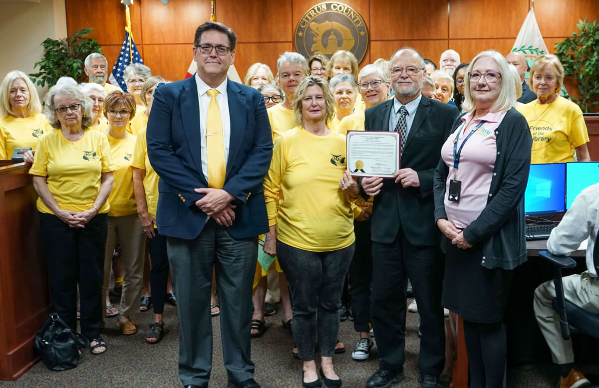 Friends of thge Citrus County Library System standing with BOCC and Library staff with National Library Week Proclamation