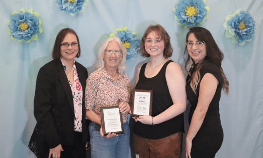 Coastal Region Library Outstanding Volunteer award winner Gwen Strawitch and 2023 Teen Volunteer of the year AJ Ward